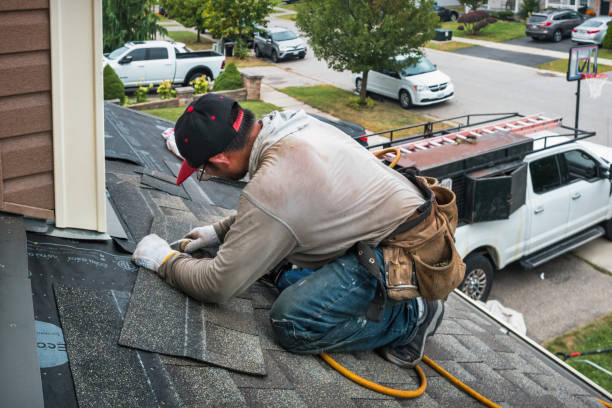 Professional Roofing technician working in Intercession City, FL